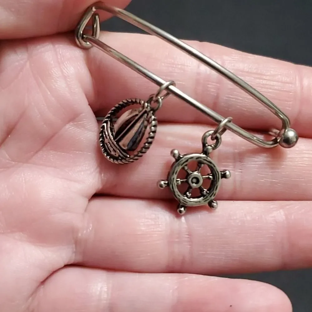 Silver tone sailing themed charm bangle bracelet 7.25